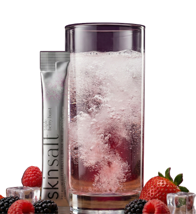 Skin Salt glass with berries on countertop
